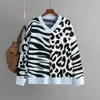 2023 Herbst/Winter Neuer europäischer und amerikanischer Außenhandel Heißer verkaufender Amazon-Pullover Leopardenmuster-Kombinations-Strickpullover-Pullover