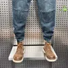 Herr jeans retro sömmar lapp mode streetwear utomhus casual byxor högkvalitetskläder