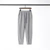 Calças de grife bordadas pequenas etiquetas simples cor sólida esportes casuais calças com cordão seção fina masculina terry jogging sweatpants