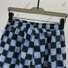 24ss designer mens shorts homens checkerboard jacquard carta impressão curta verão calças de luxo moda casual calças de algodão calça casual calças