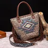 Leopard mönster tygväska ny stil aztec blommor duk handväska mode frans trim axel väska kvinnor trendiga blixtlås tassel geometriska crossbody väskor
