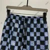 24ss designer mens shorts homens checkerboard jacquard carta impressão curta verão calças de luxo moda casual calças de algodão calça casual calças