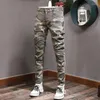 Jeans masculinos Hight Street Moda de moda elástica Camuflagem Militar calças de designer emendado Multi Bolsetes Hip Hop Cargo