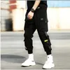 Mince Streetwear pantalons décontractés hommes rubans Harem Jogging pantalon mâle Slim Fit printemps Cargo pantalon multi-poches femmes pantalon 231227