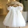 Robes de fille o-cou appliques sans manches ceinture à lacets en lacet les robes d'anniversaire simples robe de robe de bal de princesse à plusieurs niveaux à fleurs élégantes