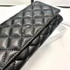 Berömda varumärkesplånbok Designer Kvinnor Fashion Clutch Bag Högkvalitativ äkta läder Paris 19 Classic Down Diamond Lattice Fold Over Card Clip Ny stor kapacitet