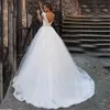 Atemberaubende Bride 2024 Elegante Tüll-Perlenschärpe Übergröße Hochzeitsballkleider U-Boot-Ausschnitt Schnürung am Rücken Prinzessin Illusion Brautkleider