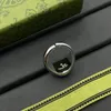 Mens glänsande guldkvalitet Ringdesigners Alloy Letter G Rings Dainty Womens Rings Trendy Oval Fracture Band Ladies Mens Lovers Jubileumsgåvor