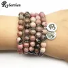 Ruberthen 2018 natürliches schwarzes Ader-Rhodonit-Armband, Baum des Lebens, Ohm-Charm, heilende Perlen für Frauen J1907223131