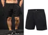 Nouveaux shorts de basket élastique de basket-ball rapidement lâches lâches de sport Men039 Running shorts sports patchwork bodybuilding masque shor5051416