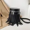 outlet wholesale women shoulder bag 2 colors street spice tassel bucket bag this year's popular personality rivet handbag cylinder shaped leather backpack 62128#