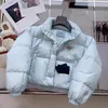 Designerjack herfst- en winterdamesmode driehoekige labeldecoratie verdikte warme dunne korte katoenen jas