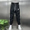 Pantaloni sportivi a righe floreali alla moda Pantaloni da jogging da esterno Abbigliamento da uomo di marca di alta qualità