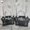 24SS 디자이너 Western Empress Dowager 's Bag 여성의 새로운 토성 악어 패턴 래커 가죽 핸드 헬드 만두 베트 베티 미니 크로스 바디 백