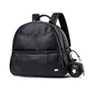 Sac à dos de couches de mode PU Black pour bébé Sac à couches de poches imperméables de grande capacité pour le sac à poussette de voyage mère 231227