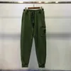 Pantaloni funzionali sottili come la pietra Tasche laterali con logo Leggings sportivi basic da uomo e da donna Versatile Nero Verde militare