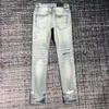 Jeans da uomo Casual Jeans slim Uomo di lusso Designer Jean Pantaloni elasticizzati Distruggi trapunta con striature al ginocchio Pantaloni denim dritti strappati Pantaloni da strada hip hop