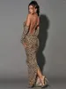 الفساتين غير الرسمية Ahagaga الموضة عبر هالترنك فستان طويل مثير صدر جوفاء عاريات النمر غمد المطبوعة