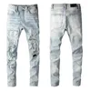 Strappato per pantaloni denim patchwork con stelle applicati Pantaloni hip-hop High Street Abbigliamento da uomo Jeans da moto slim di marca