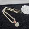 Women Designer French Luxury Pearl Necklace Classic Double Letter Sunflower a forma di perle a forma di perle intarsia