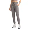 Pantalon actif stretch cordon de fitness poche de yoga lâches femmes