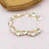 Nieuwe mode broche vol diamanten Persoonlijkheid elegante revers veelzijdige temperament pin trui accessoires rood goud Parel Diamant zilver Messing een broche 9070