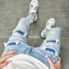 Män hål avslappnade mager jeans byxor streetwear manlig snygg rippad solid hiphop slim denim byxor 231227