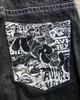 American Classic Retro Comic Pocket Print Mens Black Jeans Harajuku High Street Low midja Löst floormoppingbyxor 231228