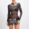 Kvinnors badkläder kvinnor sexig mini bodycon klänning glitter tryck hålig hals långärmad mesh ren vår höst modefest