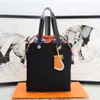 Simple and generous shopping bag, famous designer handbag, large capacity, large space, cute animal pendant, women's and men's universal seasonal shopping shoulder bag