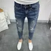 Jeans classici stile coreano da uomo 2023 blu strappati per uomo Pantaloni cargo skinny estivi alla moda alla moda 231228