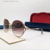 Nuevo diseñador de moda para mujer gafas de sol 0595 marco grande redondo marco hueco simple popular gafas de calidad superior uv400 lentes para exteriores