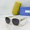 Óculos de sol ovais grandes de grife, pernas de metal da moda, mudança de cor de alta qualidade e lentes resistentes a UV400, caixa de embalagem original top de linha GG1409SK