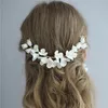 Peine de pelo nupcial de flor de arcilla de alta calidad, peine de pelo hecho a mano con diamantes de imitación, tocado de boda, fiesta de graduación, joyería para el cabello, novias Y200409198Z