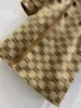 Robe de créateurs Trime à rayures épissées hautes jupes minces à glissière ouverte jacquard tissu slit conception jupe 2 couleurs Vêtements pour femmes 290