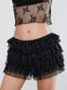 Kvinnors shorts Kvinnor Ruffled skiktad elastisk midja spetsar korta byxor blommar streetwear s-xl