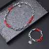 24FW Nya franska designsmycken Silver Red Titanium Steel Splice Halsband för män och kvinnor Fashion Ball Party Armband Accessories