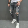 Mężczyźni Stylowe rozryte chude dżinsy ołówkowe spodnie streetwearu męskie dziury hip -hopowe rozciągnij Slim Denim Spodni 231227