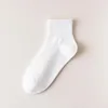 Chaussettes en coton pour hommes, couleur unie, blanc, noir, bleu, respirantes, mode d'affaires, tricot, Harajuku, Streetwear, chaussettes longues