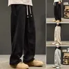 Calça masculina cor sólida cor de perna larga de perna larga perna larga calça de moletom com bolsos da cintura de cordão para homens esportes de outono aconchegante