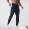 Pantaloni da uomo Jogger Pantaloni lunghi Sport Quick Dry Dstring Tasche da palestra Pantaloni sportivi Pantaloni da uomo Casual Elastico in vita Fitness Drop Delivery Dh1Ni