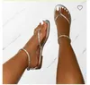 Kvinnors sandaler sommarläder sexig ljus gladiator sandaler kvinnor mode plattskor strass guld sandalias mujer 231227