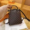 Saco de designer de alta qualidade mulheres designer de moda mochila homens mochila de viagem clássico impresso revestido lona parquet couro mochila mochila