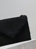 Quiltat mönster kuvertväska, svart mocka med lammullstil
