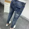 Mężczyzny Koreański styl klasyczny dżinsy 2023 Błękitne dla mężczyzn modne modne letnie chude dziury Spodni 231228