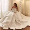 Abiti da sposa Off Picchia di spalla A abiti da sposa senza schienale a una linea Principessa 2024 Abito da sposa con guanti