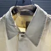 Projektantka mody Lapel Coach Jacket dla mężczyzn i kobiet pary z patchworkowymi dużymi kieszeniami stereo luźne