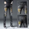 Outono/inverno novo estilo bordado impresso pés finos masculinos na moda calças jeans para homens masculino street wear