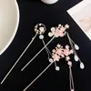 Grampos de cabelo fada antigo vento sinos orquídea franja hairpin feminino passo shake de alta qualidade qipao cabeça traseira