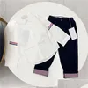 Conjuntos de ropa Diseñador Camisa de manga larga y pantalones Conjunto de 2 piezas Nueva Primavera Otoño Marca de alta calidad Casual Tide Fan Childrens Clot Dhtlf